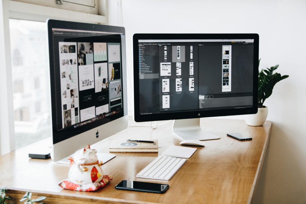two imac s with keyboard and phones on desk → blogidmwebid pexels photo 326503